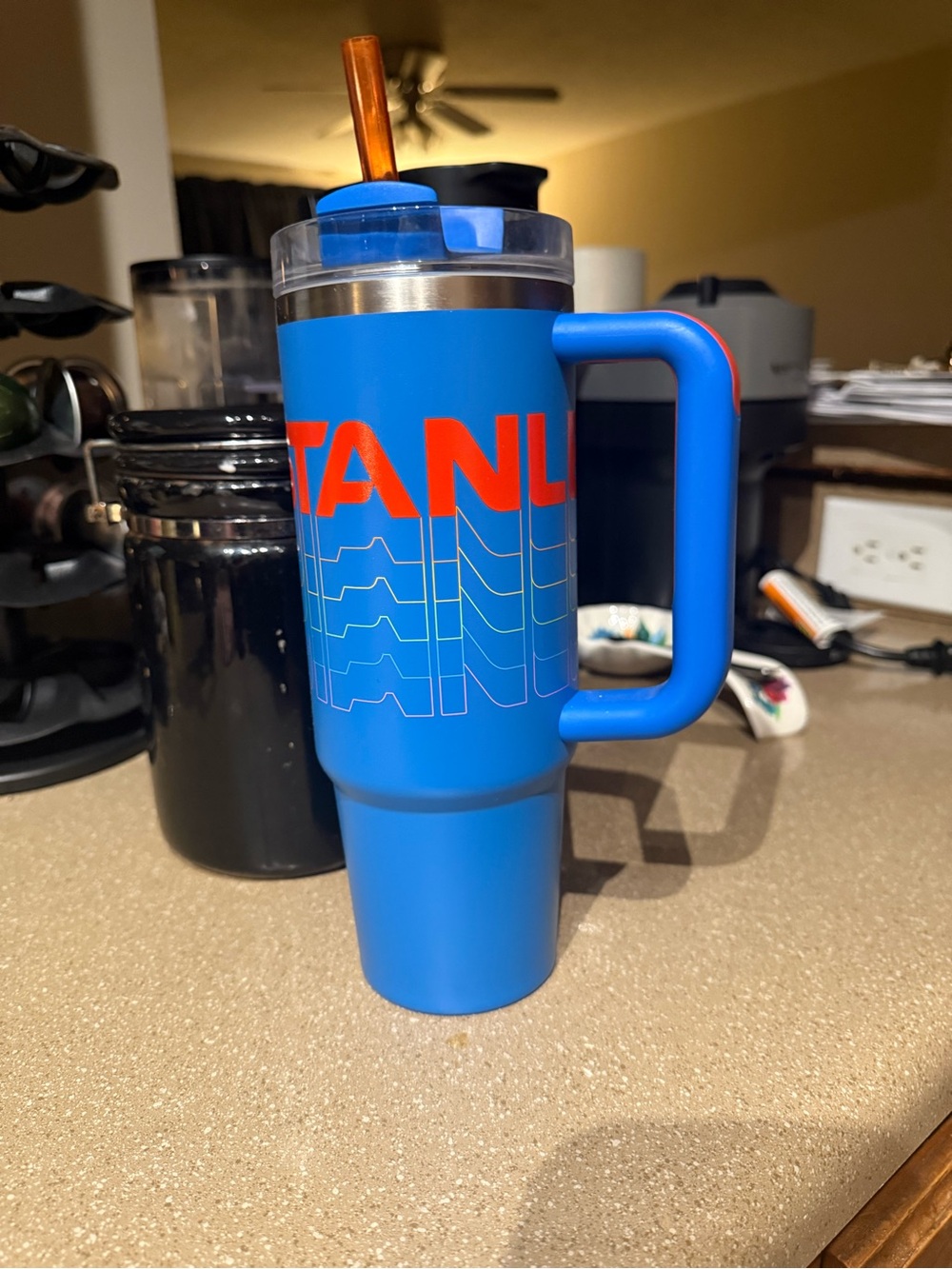 Stanley Blue Travel Tumbler with Handle and Orange Logo
